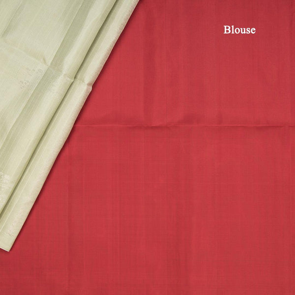 Tea Green Borderless Soft Silk Saree With Floral Zari Buttas