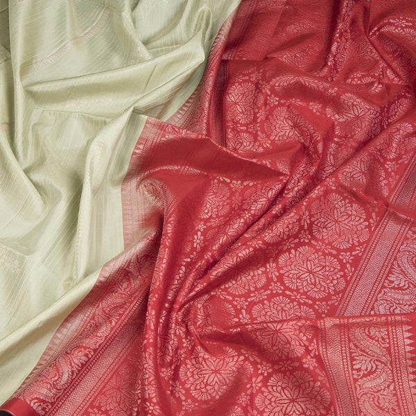 Tea Green Borderless Soft Silk Saree With Floral Zari Buttas