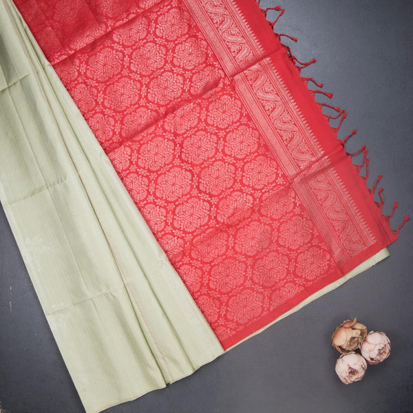 Tea Green Borderless Soft Silk Saree With Floral Zari Buttas