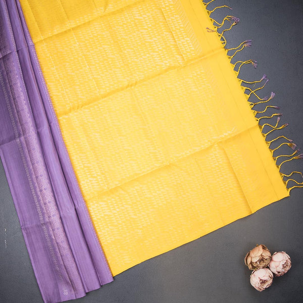Light Purple Borderless Soft Silk Saree With Copper And Silver Zari Design