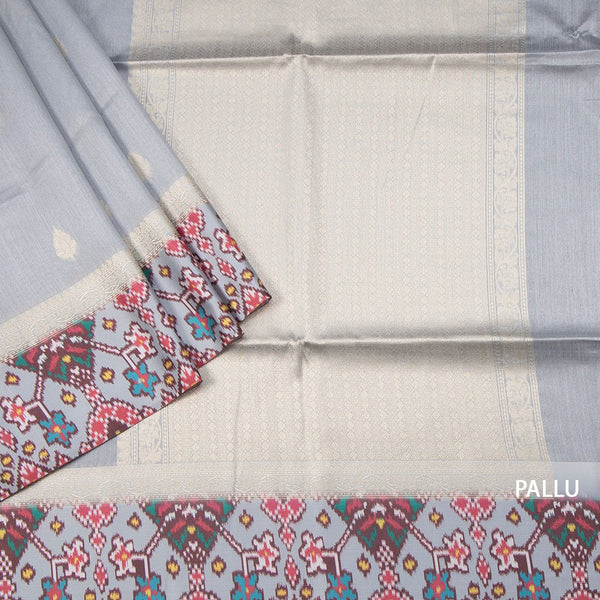 Raw Silk Grey Saree With Zari Buttas On The Body