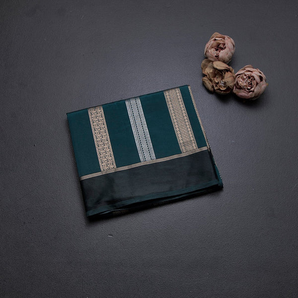 Raw Silk Teal Green Saree With Zari Stripes Design And Simple Border