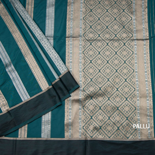 Raw Silk Teal Green Saree With Zari Stripes Design And Simple Border