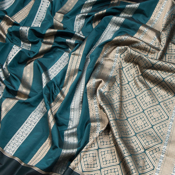 Raw Silk Teal Green Saree With Zari Stripes Design And Simple Border