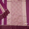 Raw Silk Magenta Purple Saree With Zari Stripes Design And Simple Border
