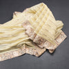 Organza Light Yellow Zari Stripes Saree With Thread Border