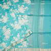 Pure Tussar Turquoise Blue Floral Printed Saree With Zari Border