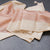Raw Silk Baby Pink Zari Stripes Saree With Printed Border
