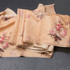 Semi Raw Silk Pastel Orange Floral Printed Borderless Saree