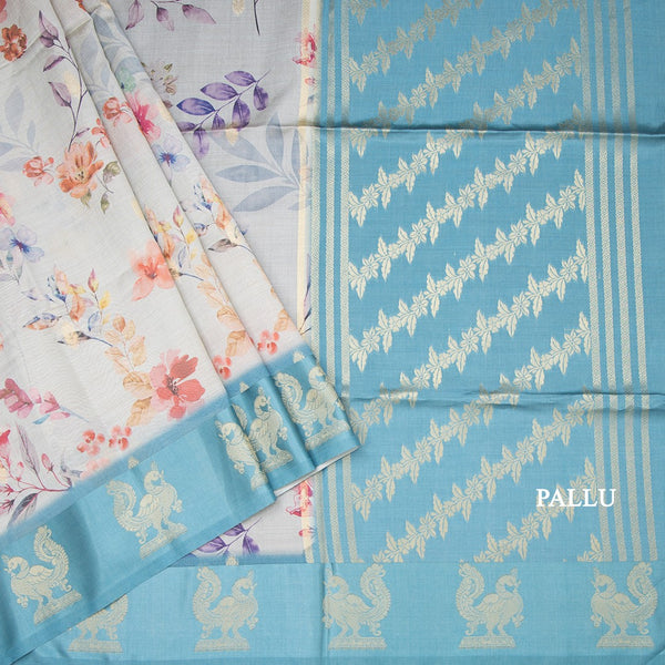 Raw Silk Light Blue Floral Printed Saree With Zari Border