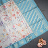 Raw Silk Light Blue Floral Printed Saree With Zari Border