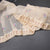 Organza Cream Floral Thread Work Saree With Zari Border