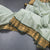 Kanchi Cotton Light Green Saree With Thread Buttas And Zari Border