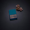 Kanchi Cotton Peacock Blue Saree With Zari Buttas And Zari Border