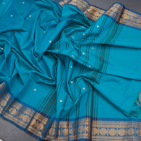 Kanchi Cotton Peacock Blue Saree With Zari Buttas And Zari Border 02 - Kumaran Silks