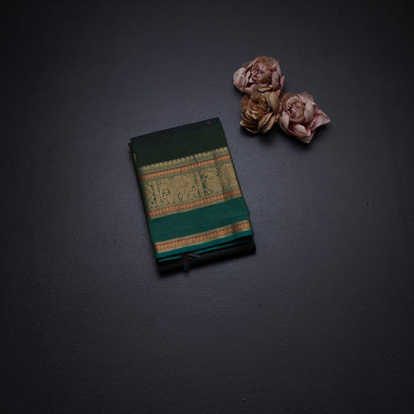 Kanchi Cotton Olive Green Saree With Zari Buttas And Zari Border