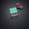 Kanchi Cotton Mint Green Plain Saree And Temple Border