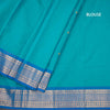 Kanchi Cotton Peacock Blue Saree With Thread Buttas And Zari Border 02