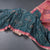 Raw Silk Teal Green Ikkat Printed Saree