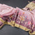 Raw Silk Baby Pink Zari Checked With floral Printed Saree And Zari Border