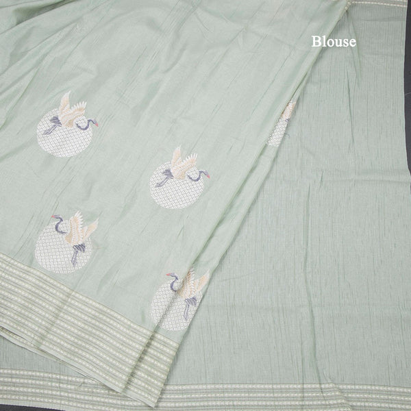 Raw Silk Light Green Thread Work Saree In Bird Design