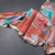 Semi Raw Silk Rust Orange Floral Printed Saree And Ribbon Border
