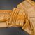 KSRTSR42490-Linen-Mustard-Saree-With-Zari-Buttas-And-Zari-Border-main