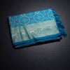 KSRTSR42537-1-Banaras-Peacock-Blue-Ikkat-Pattern-Saree-fold