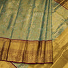 Green Tissue Silk Saree With Floral Design And Gold Zari Border