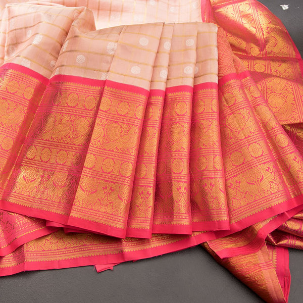 Pink Silk Saree With Peacock And Chakra Buttas On The Body With Yazhi Designed Red Border