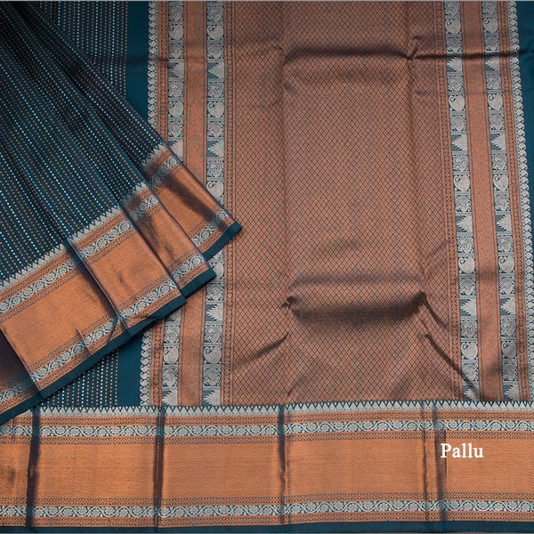Dark Green Silk Saree With Tiny Copper And Silver Zari Buttis And Zari Border