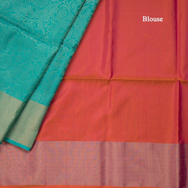 Turquiose Blue Brocade Soft Silk Saree With Orange Coloured Floral Designed Pallu