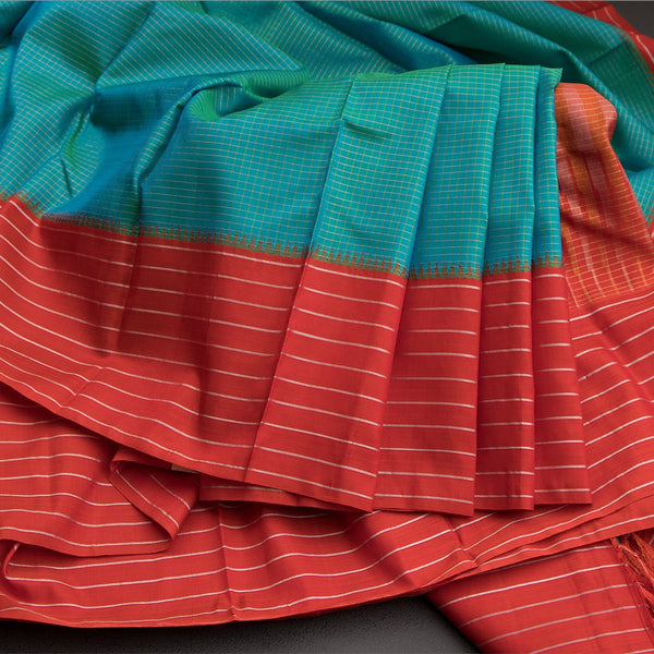 Blue Micro Checked Silk Saree With Striped Red Border