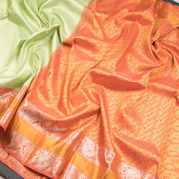 Light Green Self Designed Silk Saree With Orange Border And Gold And Silver Zari Work