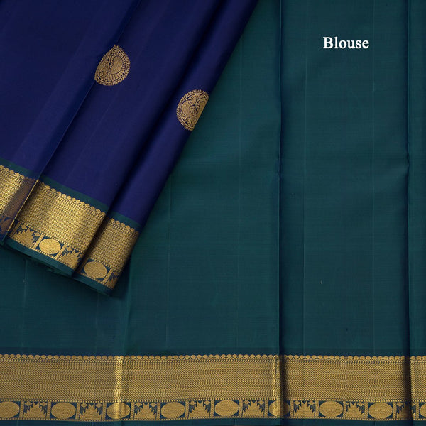 Traditional Navy Blue Kanchipuram Silk Saree With Peacock And Chakram Motifs