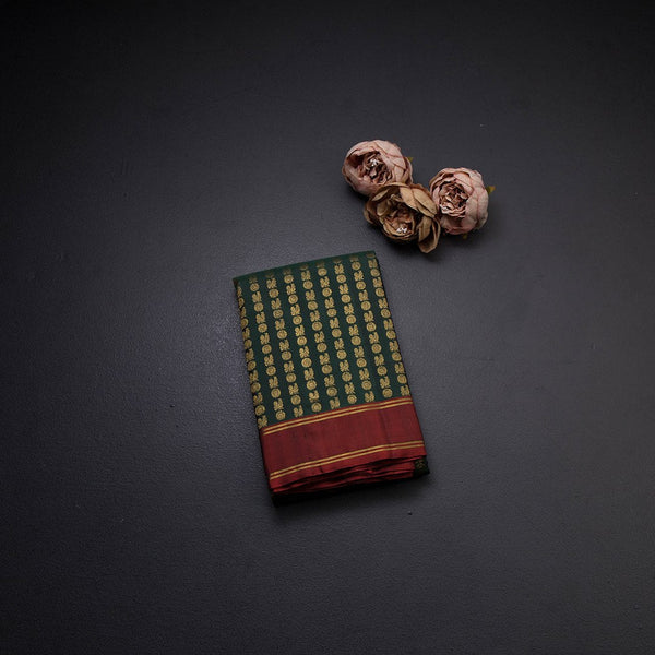 Bottle Green Kanchipuram Silk Saree With Vertically Running Chakra And Peacock Designs