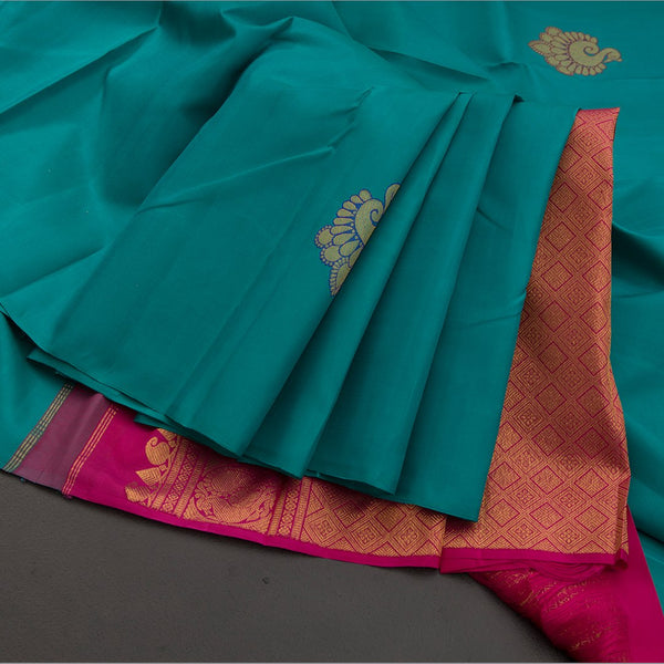 Borderless Turquoise Blue With Peacock Butta On Body With Contrast Pallu