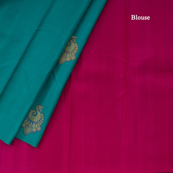 Borderless Turquoise Blue With Peacock Butta On Body With Contrast Pallu