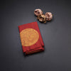 Maroon Borderless Kanchipuram Silk Saree With Floral Circle Motif On Body