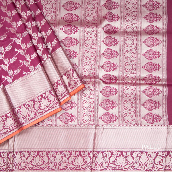 Wine Shaded Soft Silk Saree With Floral Pattern On The Body