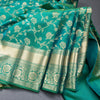 Dark Green Soft Silk Saree With Floral Pattern On The Body
