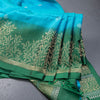 Rama Blue Soft Silk Saree With Tiny Buttis On Body And Green Leaves Patterned Border