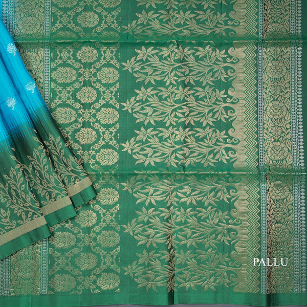 Rama Blue Soft Silk Saree With Tiny Buttis On Body And Green Leaves Patterned Border