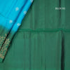 Rama Blue Soft Silk Saree With Tiny Buttis On Body And Green Leaves Patterned Border