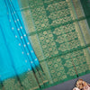 Rama Blue Soft Silk Saree With Tiny Buttis On Body And Green Leaves Patterned Border