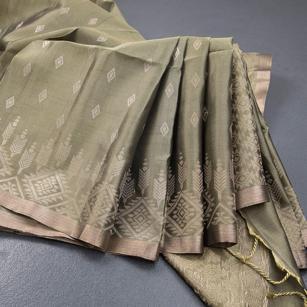 Sage Green Soft Silk Saree With Tiny Buttis On Body And Stylish Border