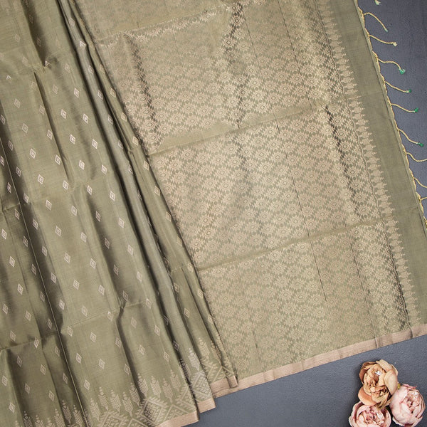 Sage Green Soft Silk Saree With Tiny Buttis On Body And Stylish Border