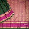 Bottle Green Silk Saree With Peacock And Chakra Buttas And Rettapet Border