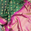 Bottle Green Silk Saree With Peacock And Chakra Buttas And Rettapet Border