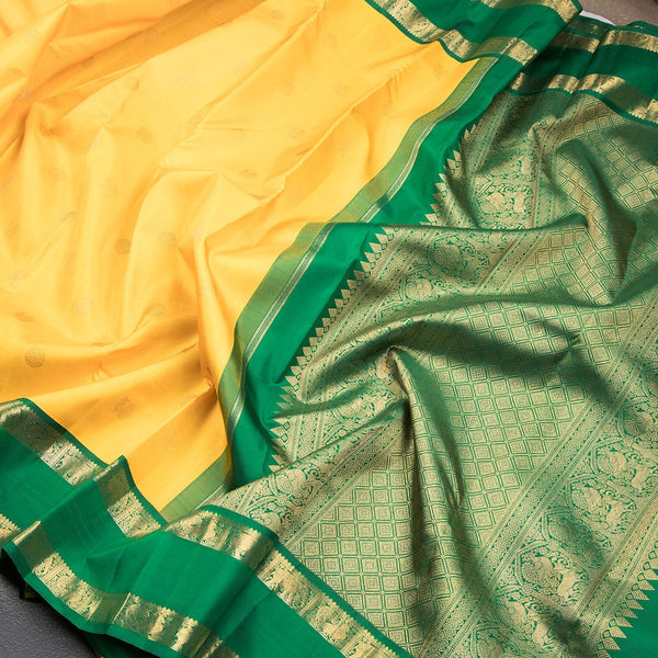Mango Yellow Silk Saree With Peacock And Chakra Buttas And Rettapet Border